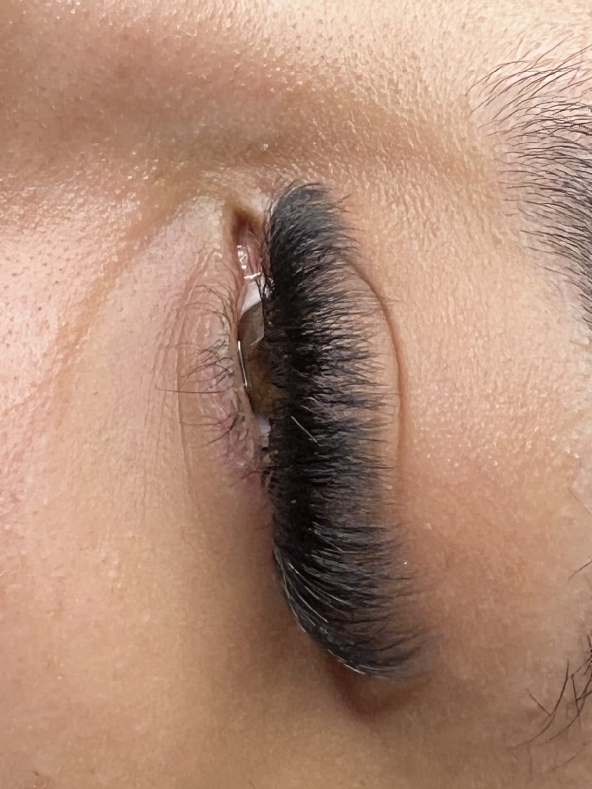 Volume lash extensions viewed from the side with eye closed by 902 Beauty Bar, Dartmouth NS