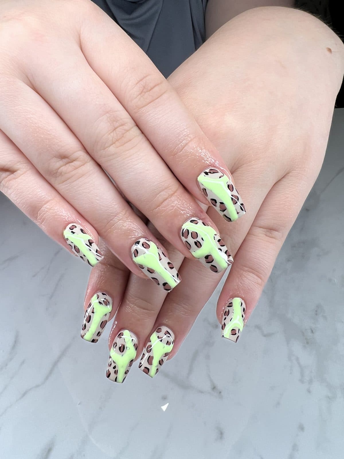 Lime green cow print nails by 902 Beauty Bar, Dartmouth NS