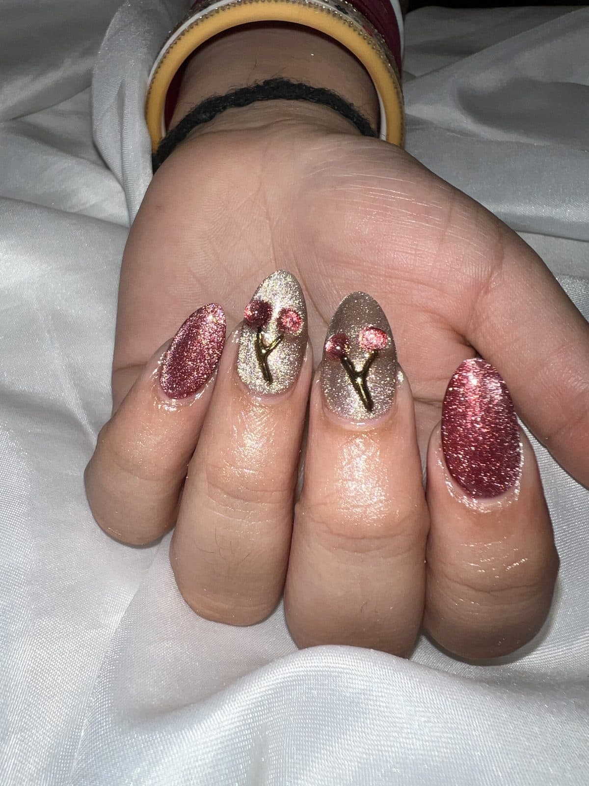 Burgundy glitter nails with gold accents by 902 Beauty Bar, Dartmouth NS