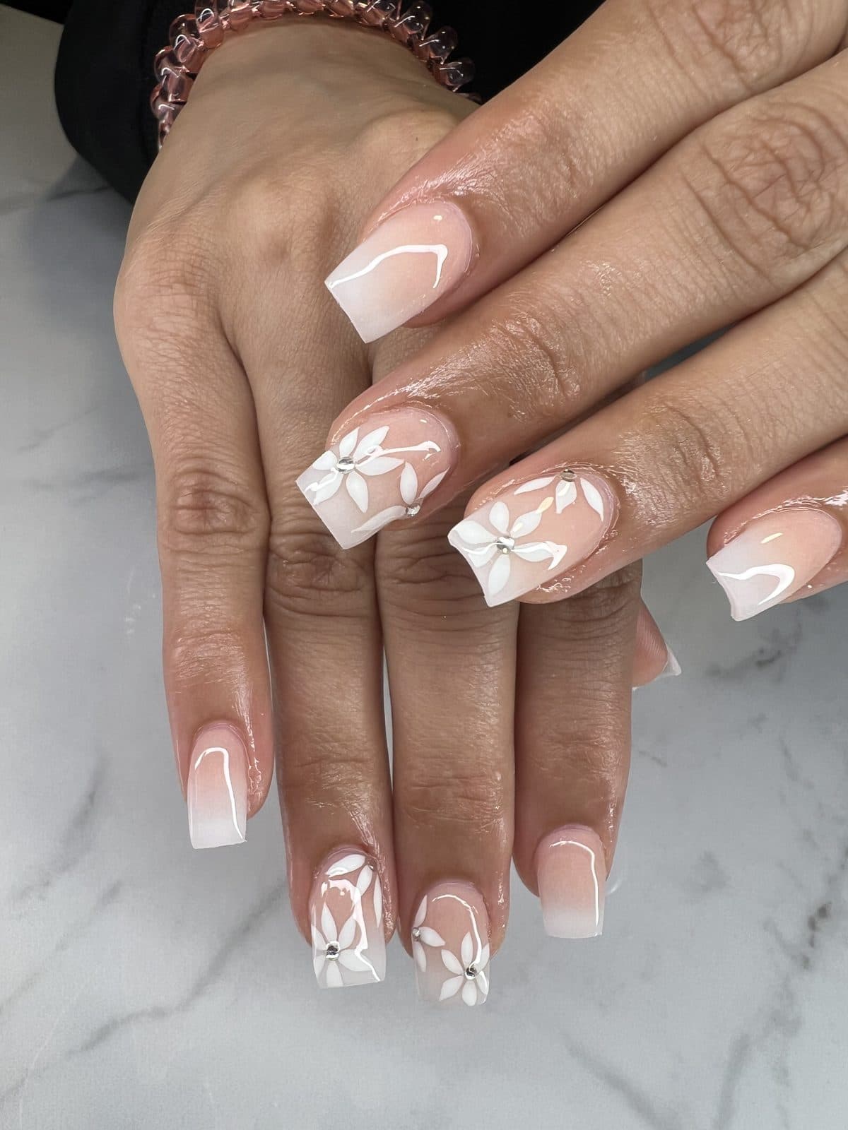 White floral French square nails by 902 Beauty Bar, Dartmouth NS