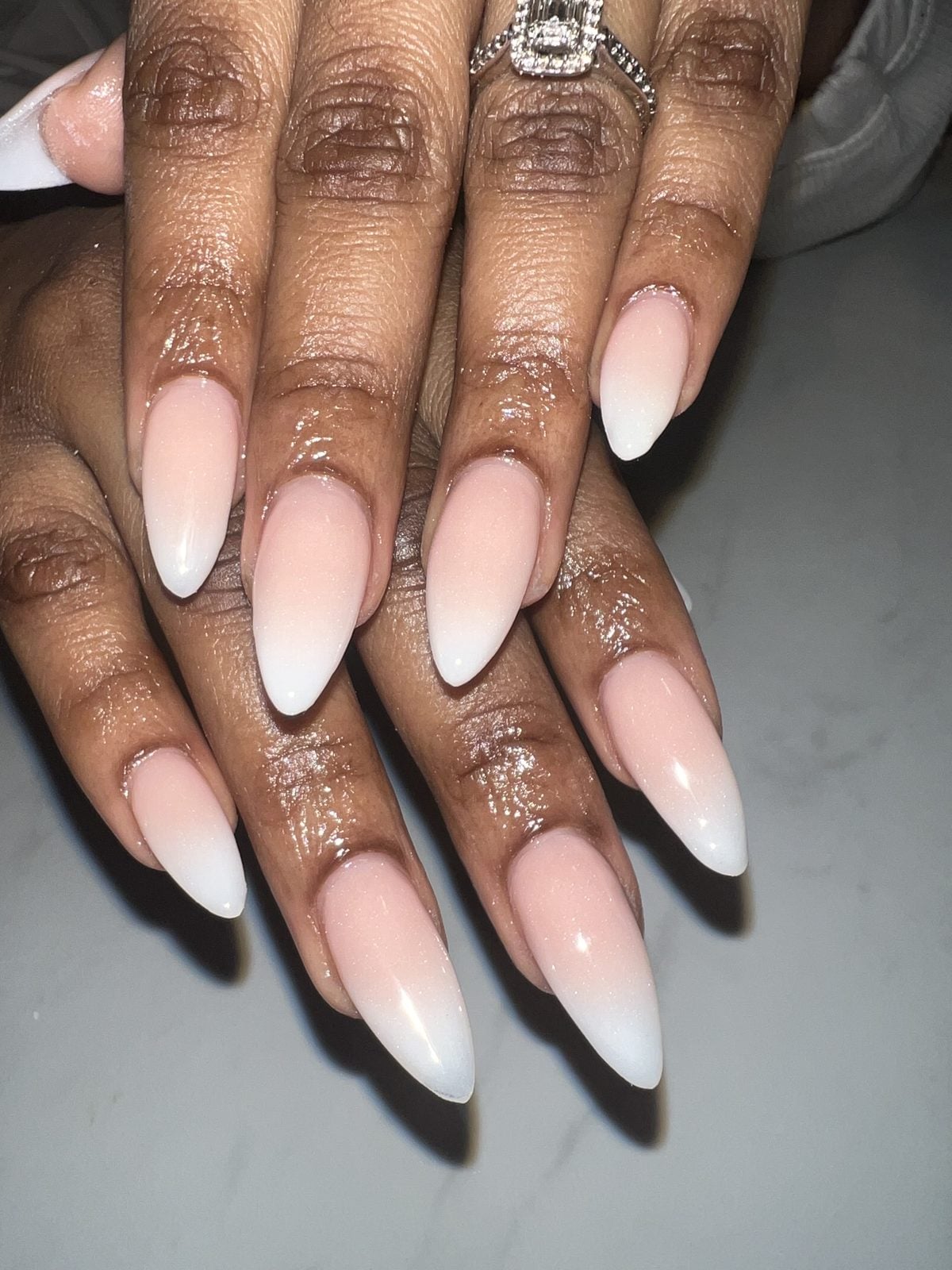 Nude to white ombré almond acrylic nails on marble by 902 Beauty Bar, Dartmouth NS
