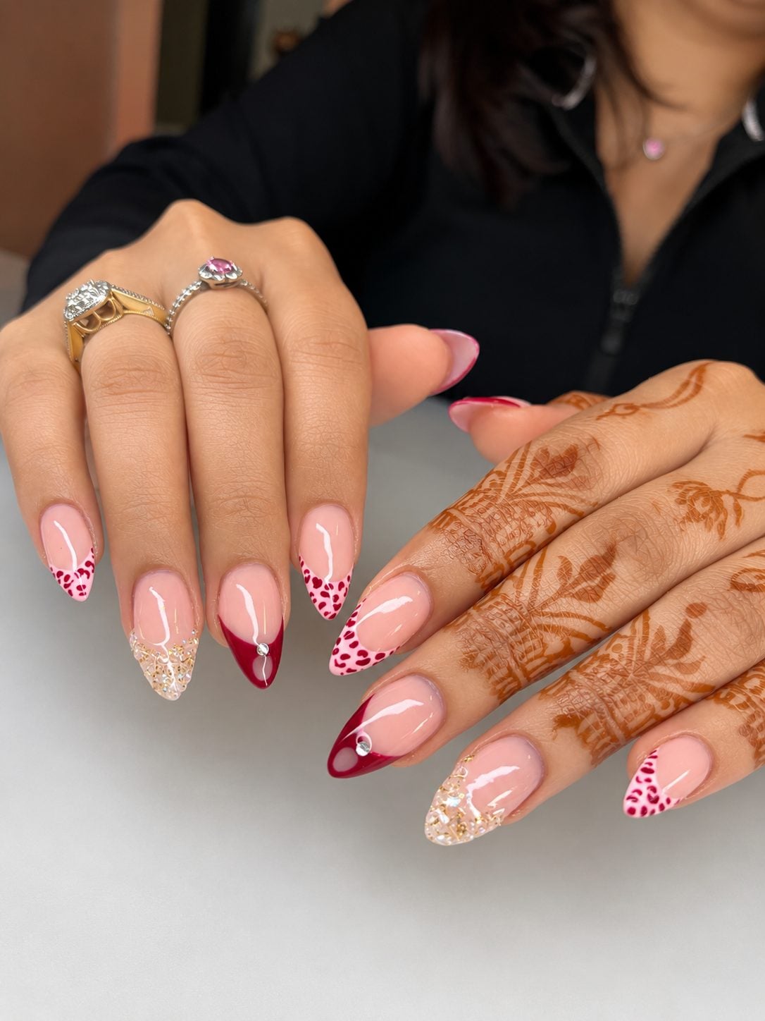 Freehand henna on hand with pink and red French nail art by 902 Beauty Bar, Dartmouth NS